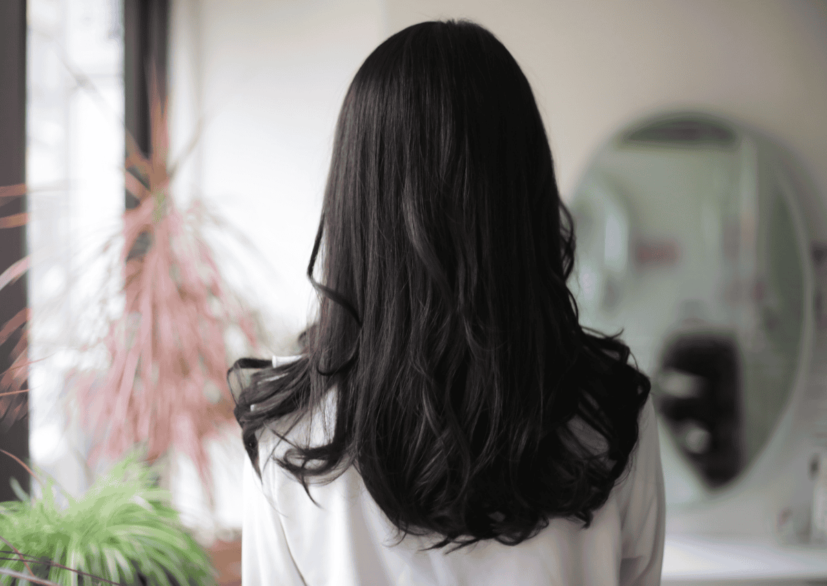 Tóc dài uốn đuôi gợn sóng